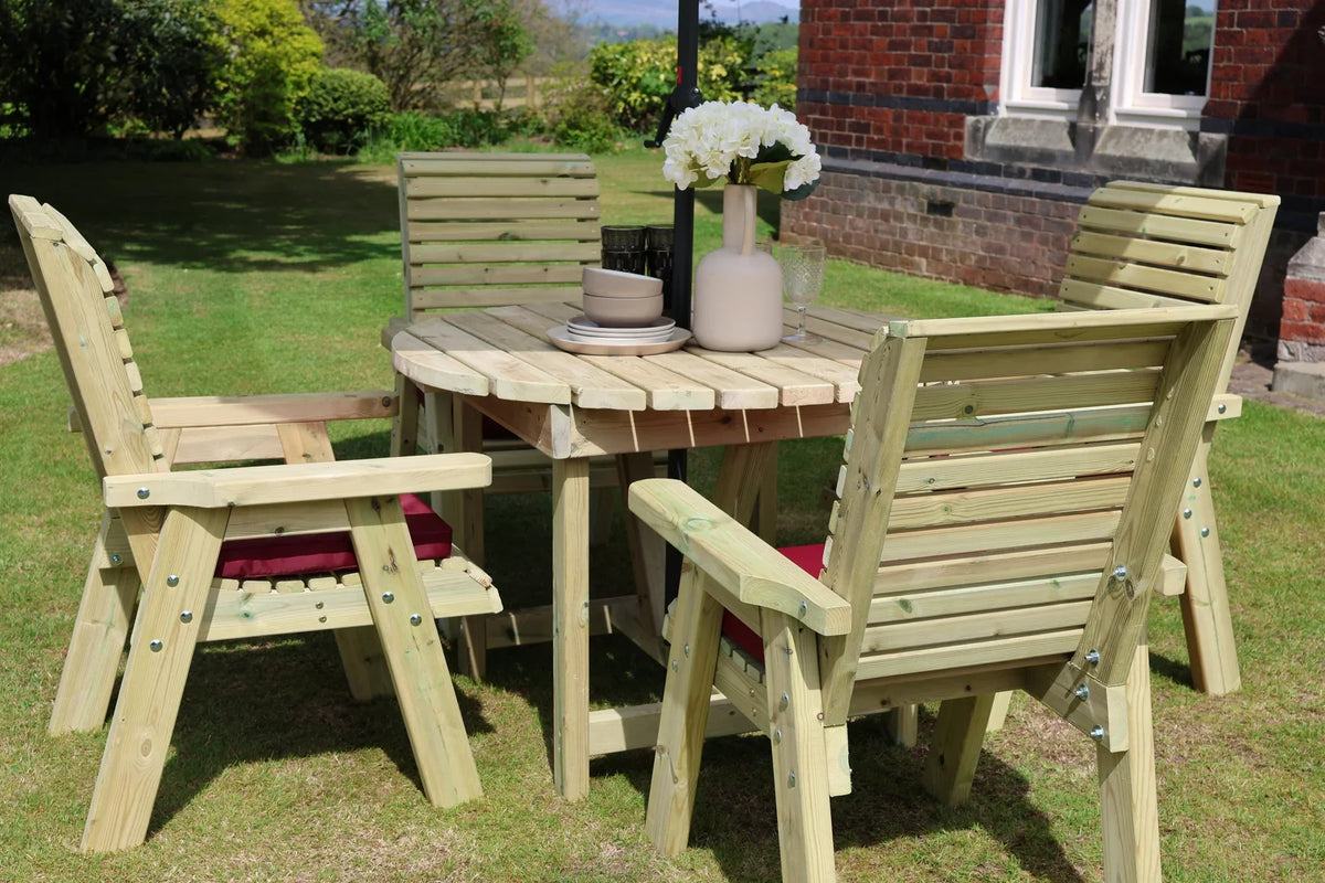 Heritage round dining table and four cushioned chairs