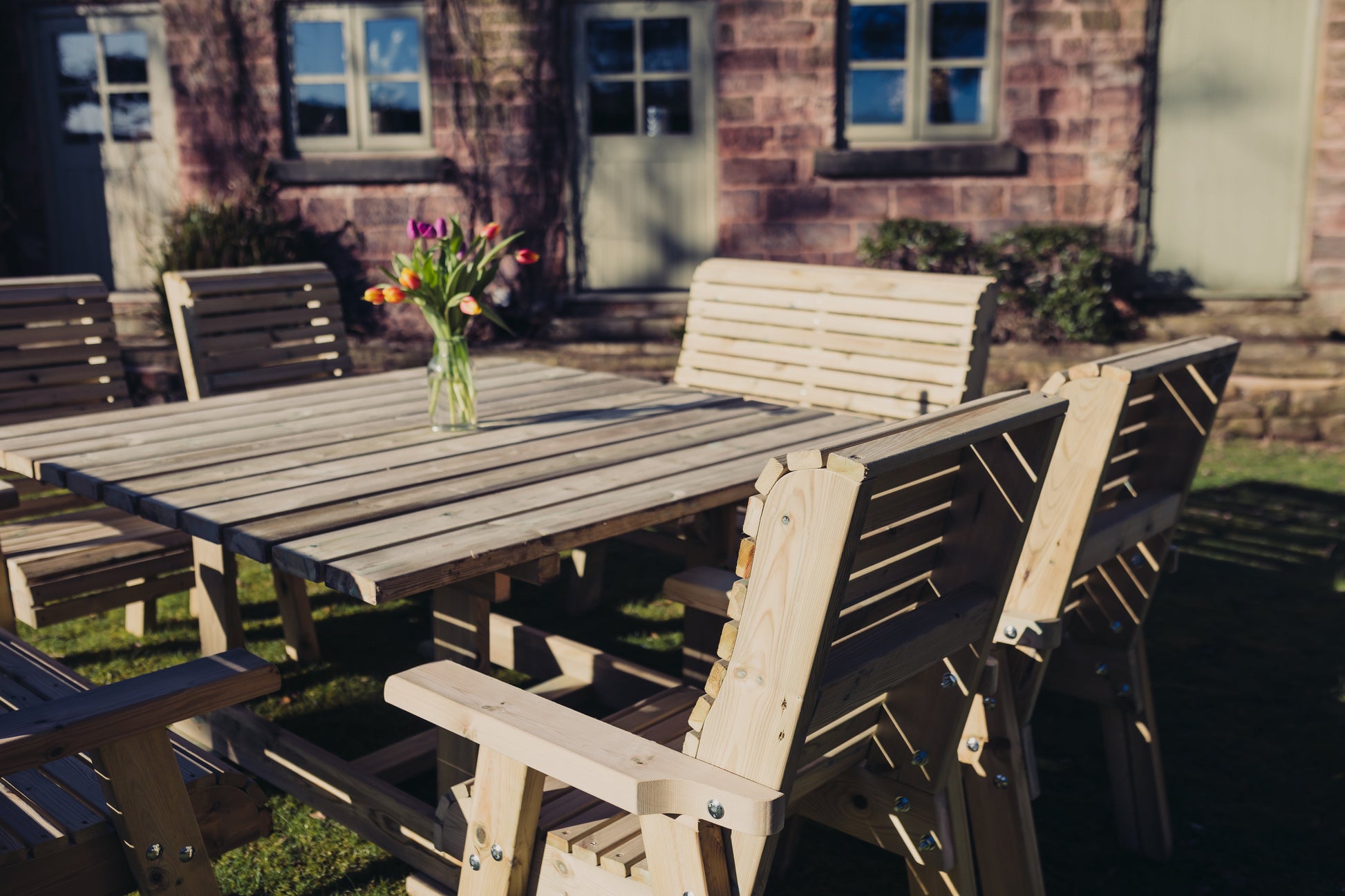 Square wooden garden dining set with mixed seating