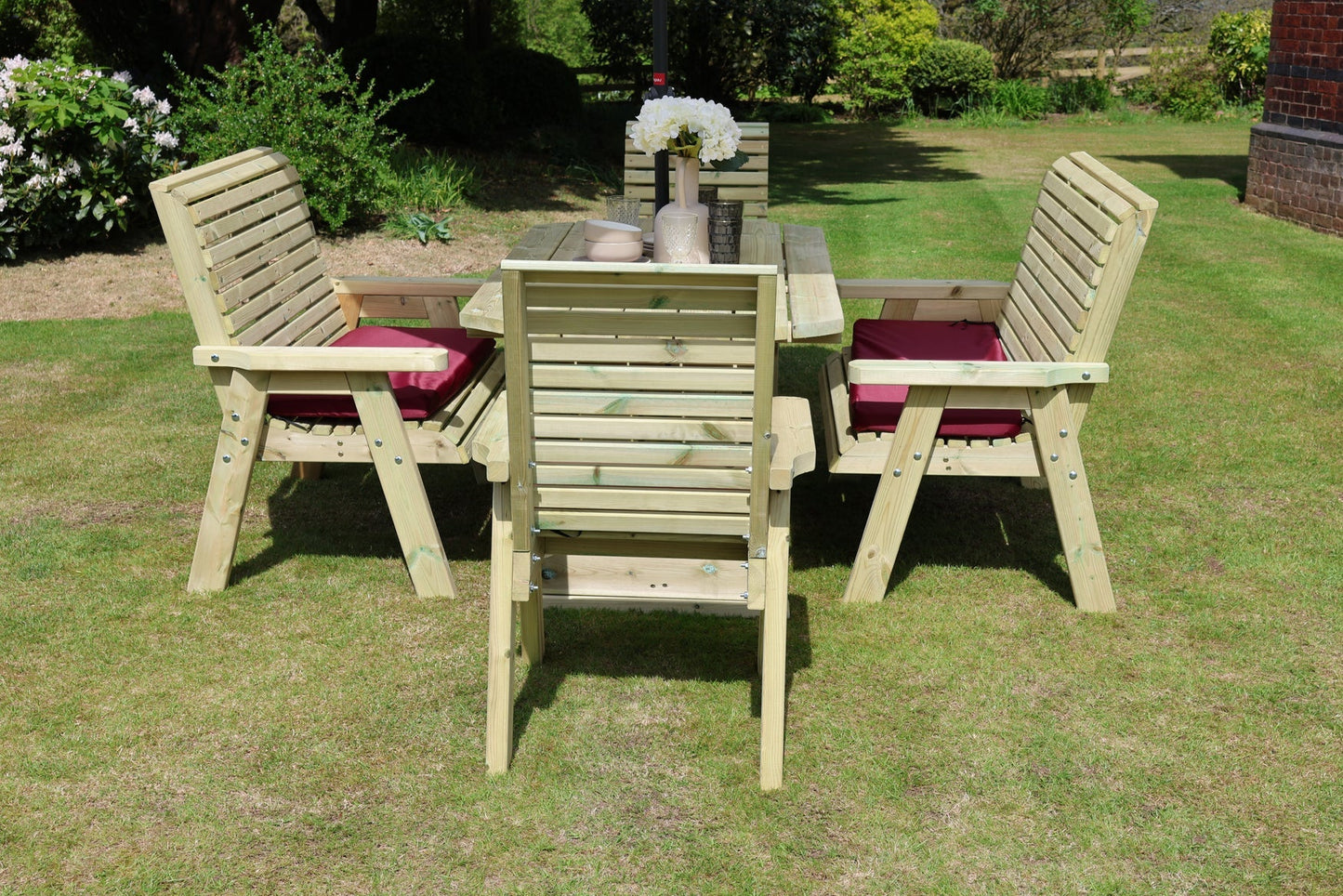 End view of Heritage Tanalised table set showing two chairs and two benches