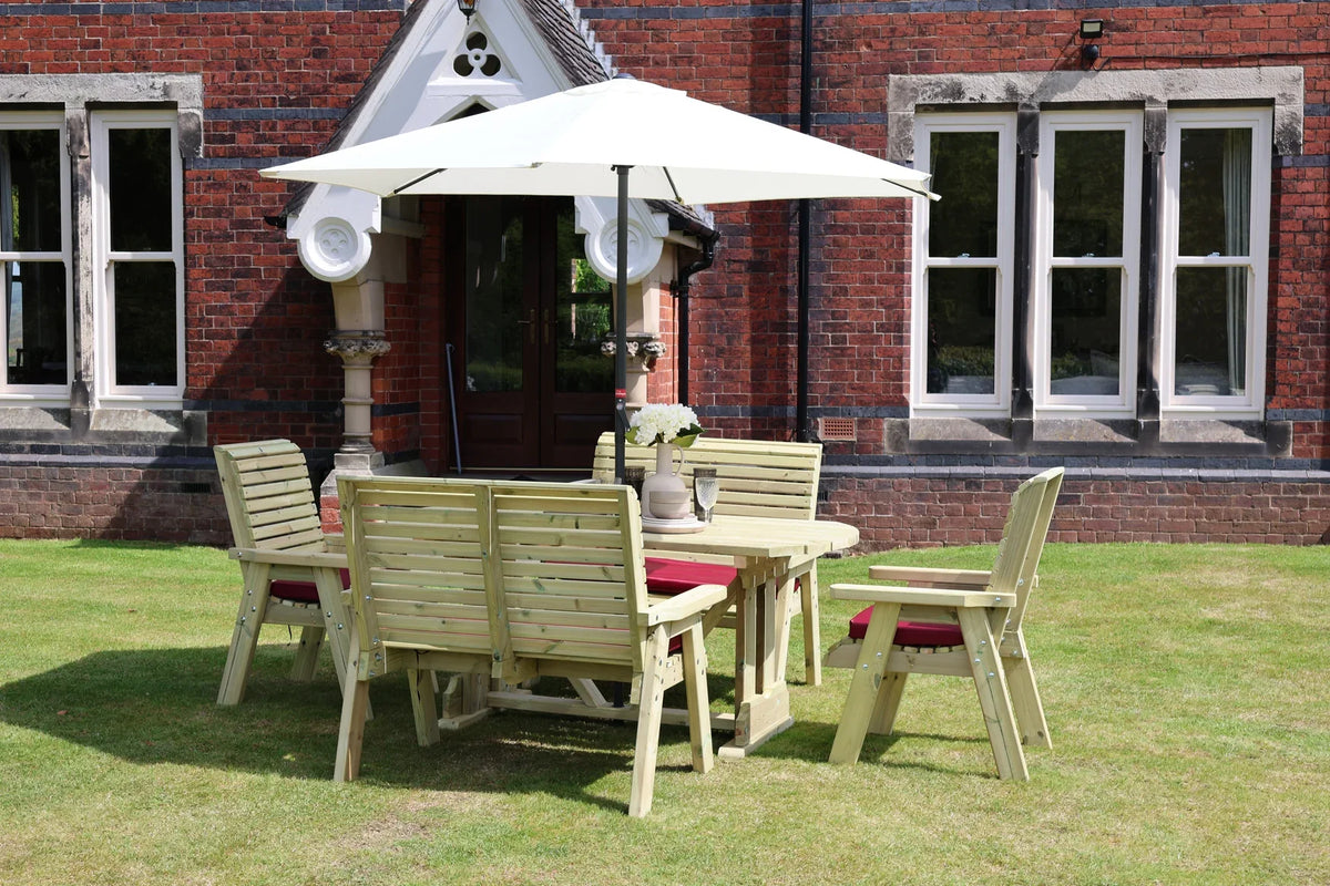 Rear lifestyle view of Heritage Tanalised 6 seat table set with cushions