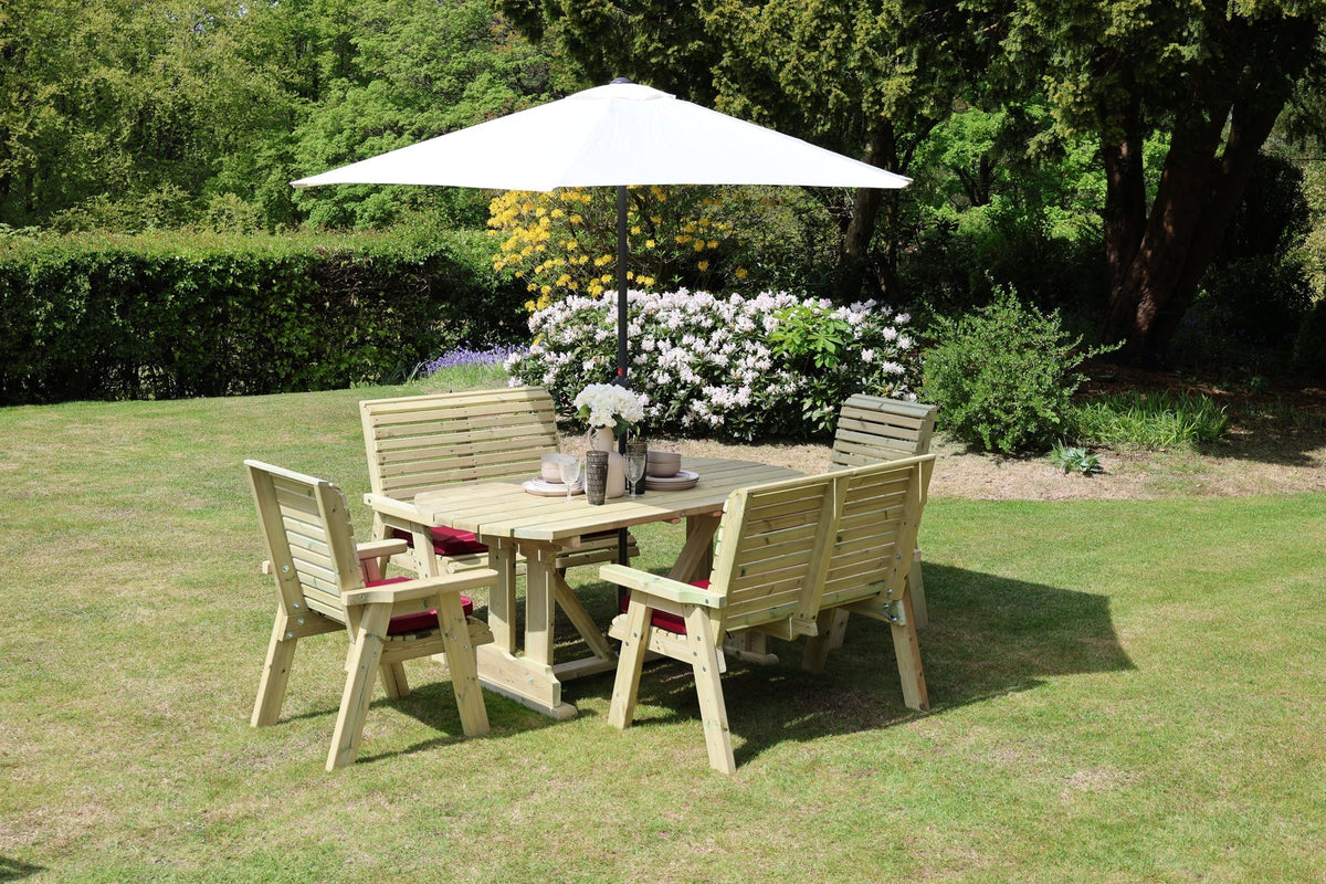Wide garden view of Heritage Tanalised six seat dining set with chairs and benches