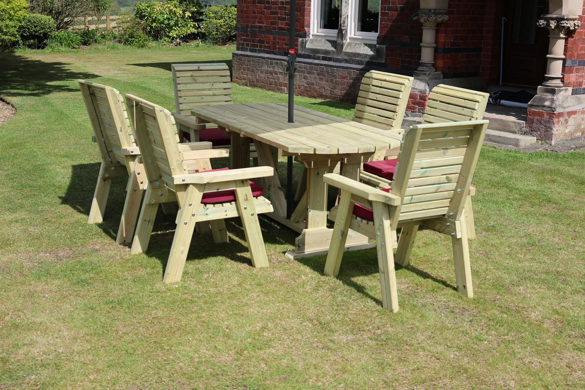 Angled view showing the Heritage Tanalised rectangular table and six armchairs