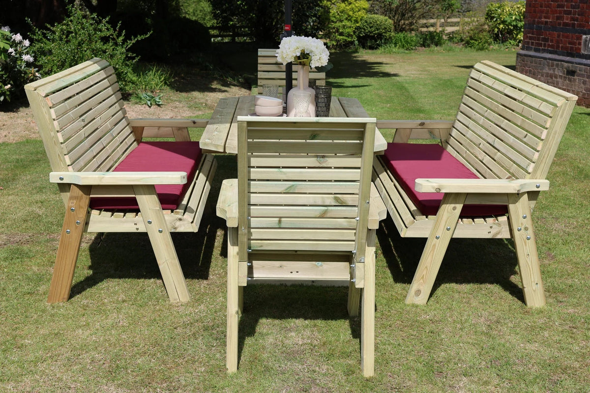 End view showing two three-seat benches and two chairs around a rectangular table