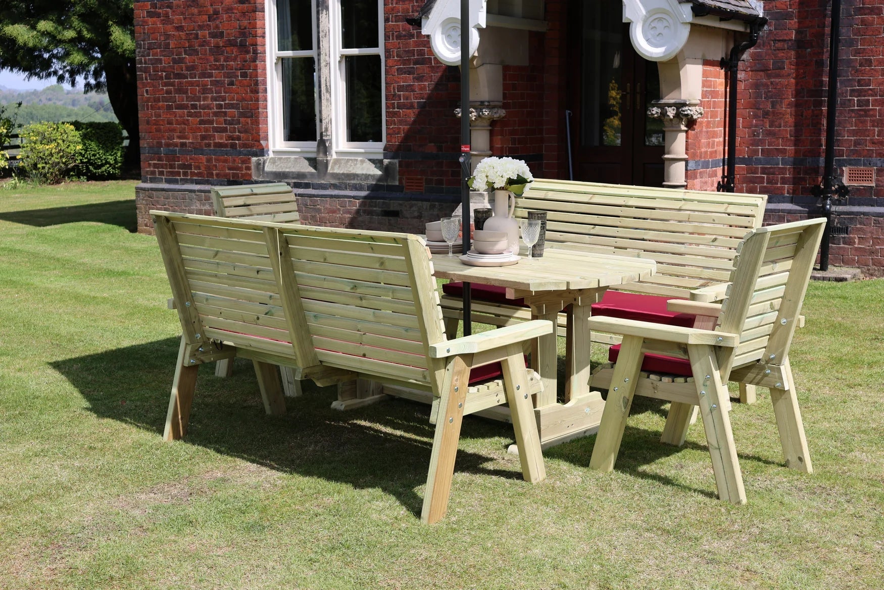 Styled Heritage Tanalised rectangular table set with two benches, two chairs and cushions