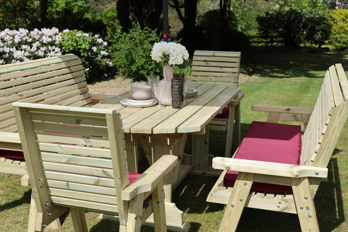 Close view of Heritage Tanalised 8 seat rectangular dining set with burgundy cushions