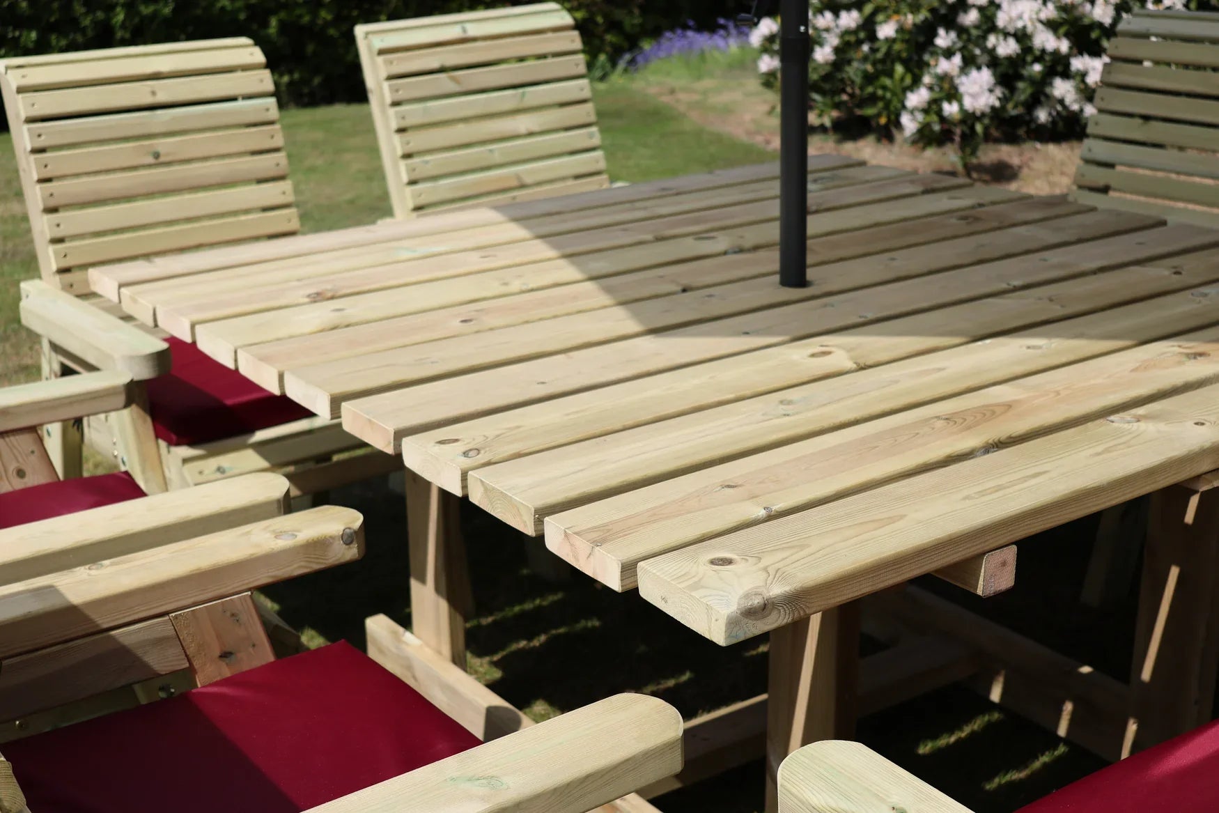 Close-up of the slatted square table on the Heritage Tanalised eight seat dining set
