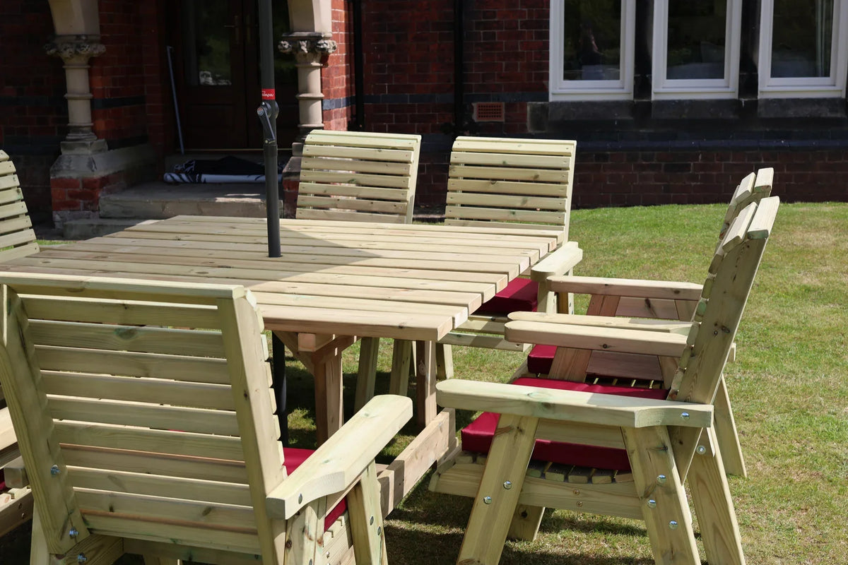 Close view of the Heritage Tanalised square table and matching garden chairs