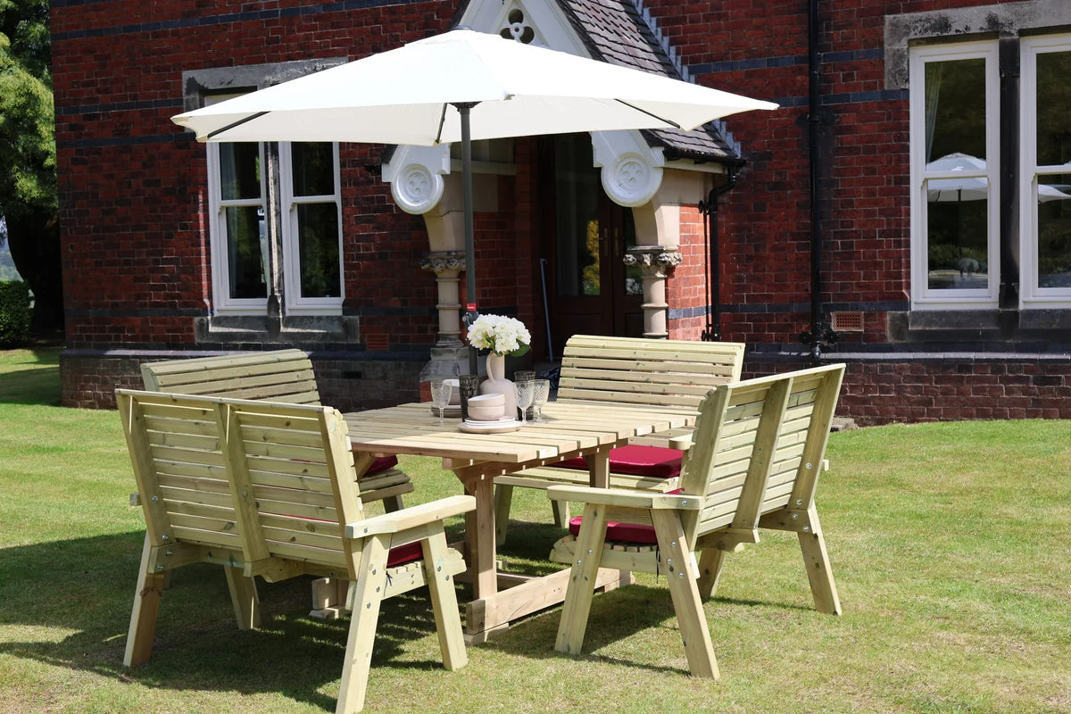 Heritage Tanalised square table with four two-seat benches in a garden setting