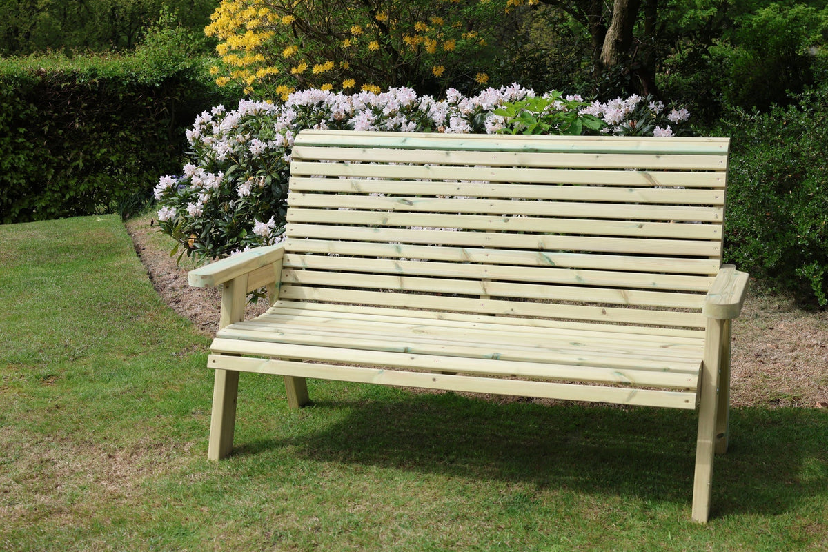Heritage Tanalised 3 seat bench in a garden